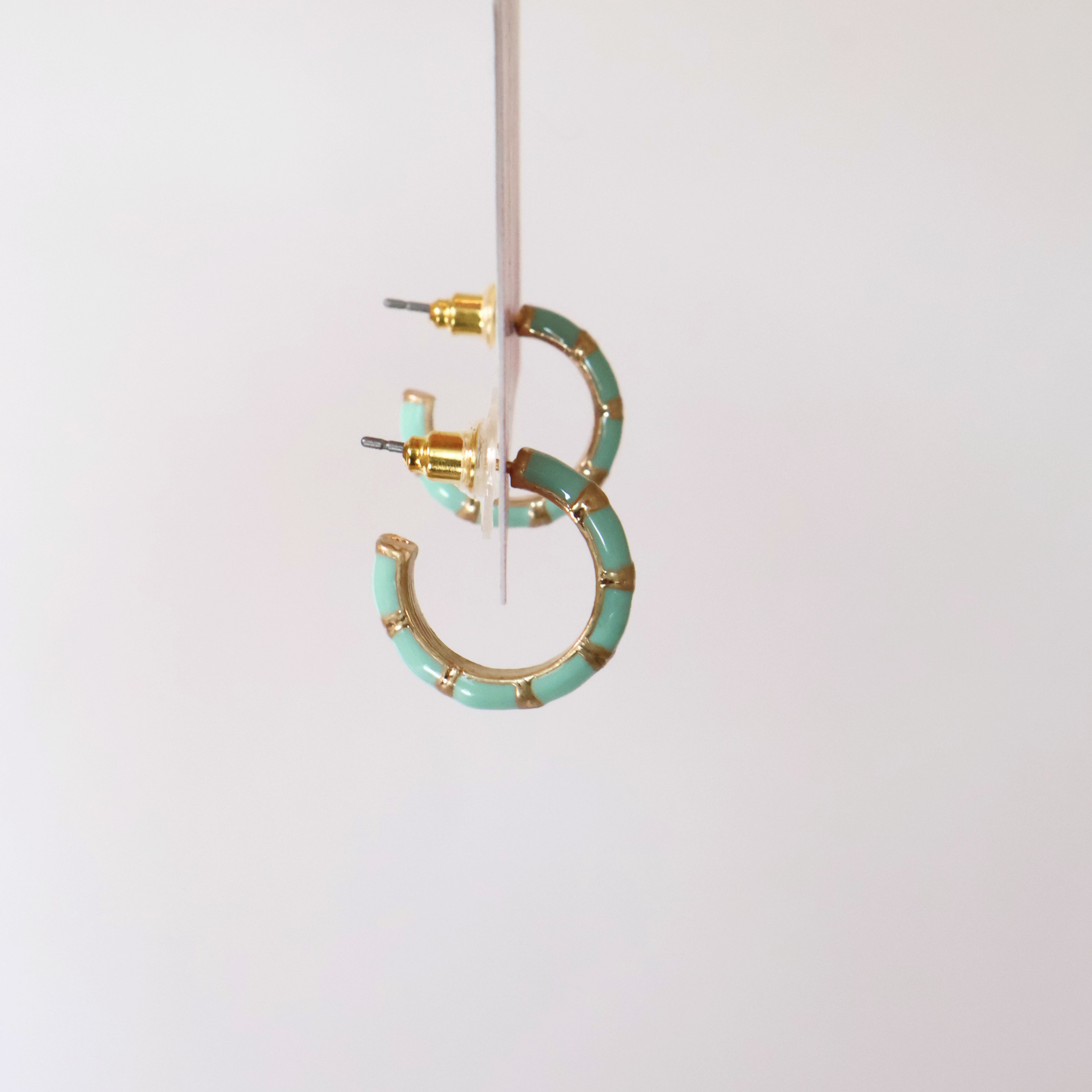 Side view of Junie Hoops on a product tag