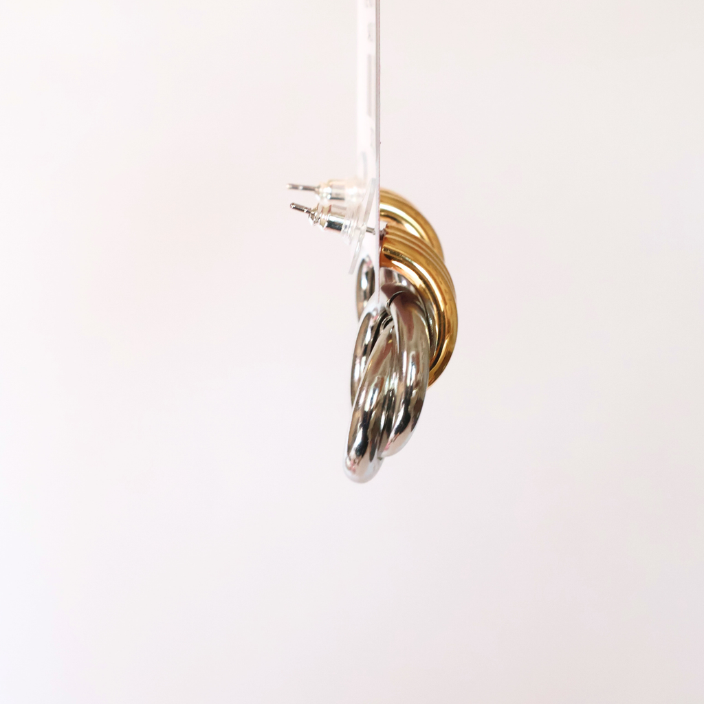 side view of the earrings on a product tag