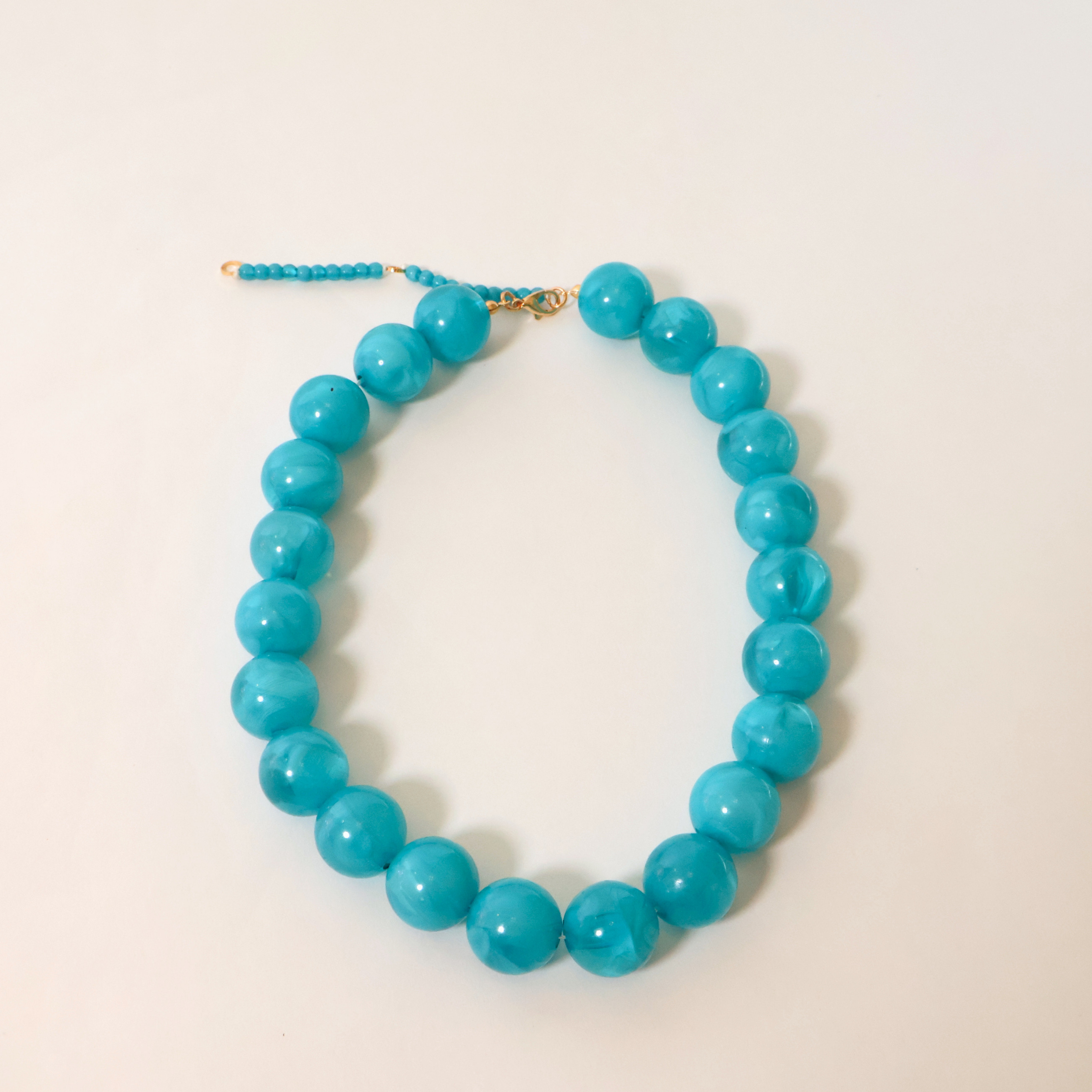 Teal Kameron Necklace on white background