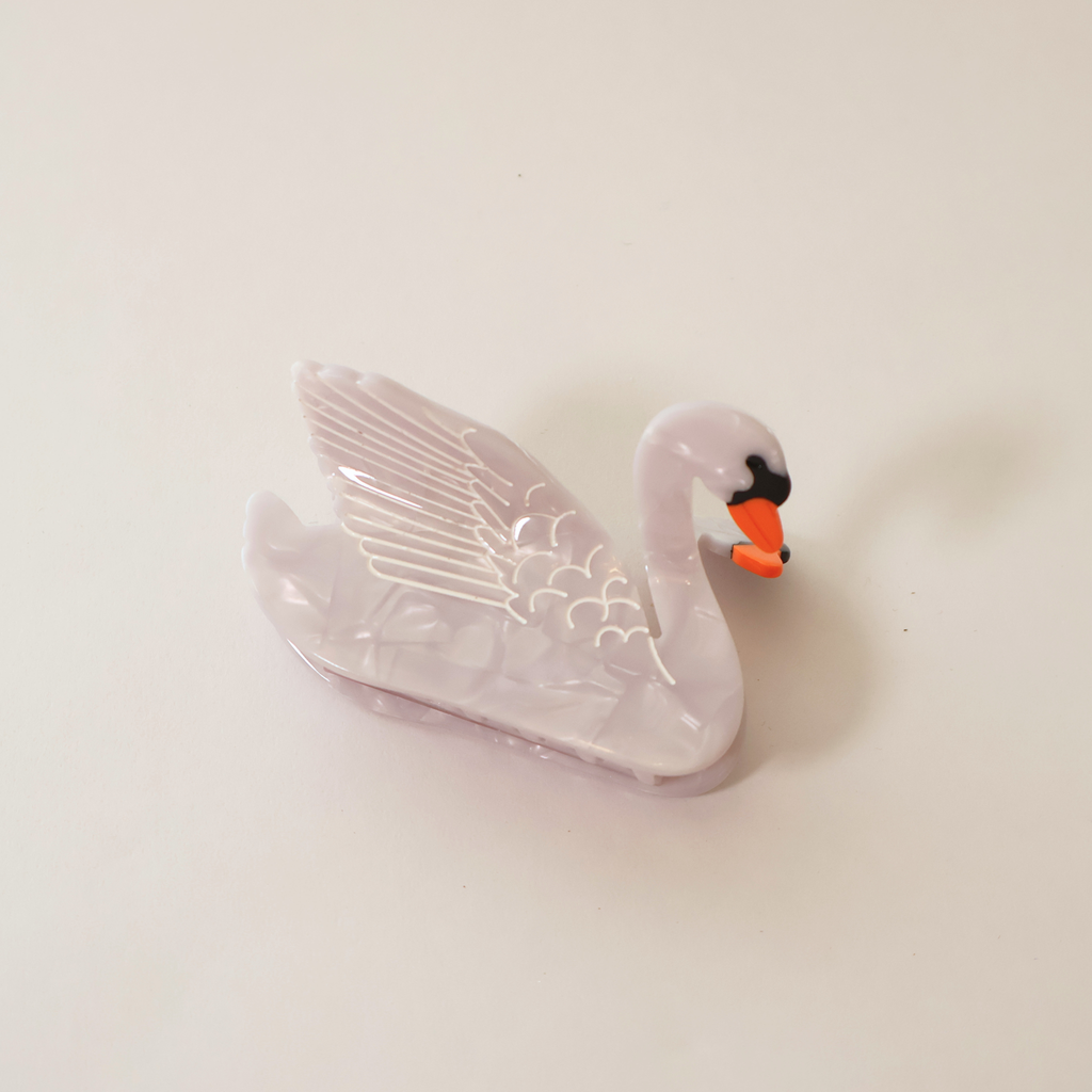 swan claw clip on its side on a white backdrop