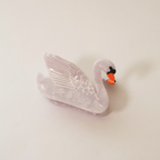 swan claw clip on its side on a white backdrop