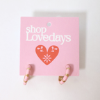 pink junie hoops on product tag