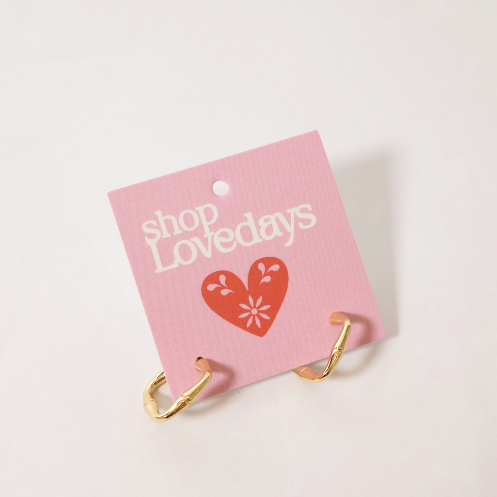 gold hoops on product tag shown on white background