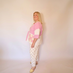 Image of the a woman wearing the Pippa tee and polkadot bonnie pants facing to the left