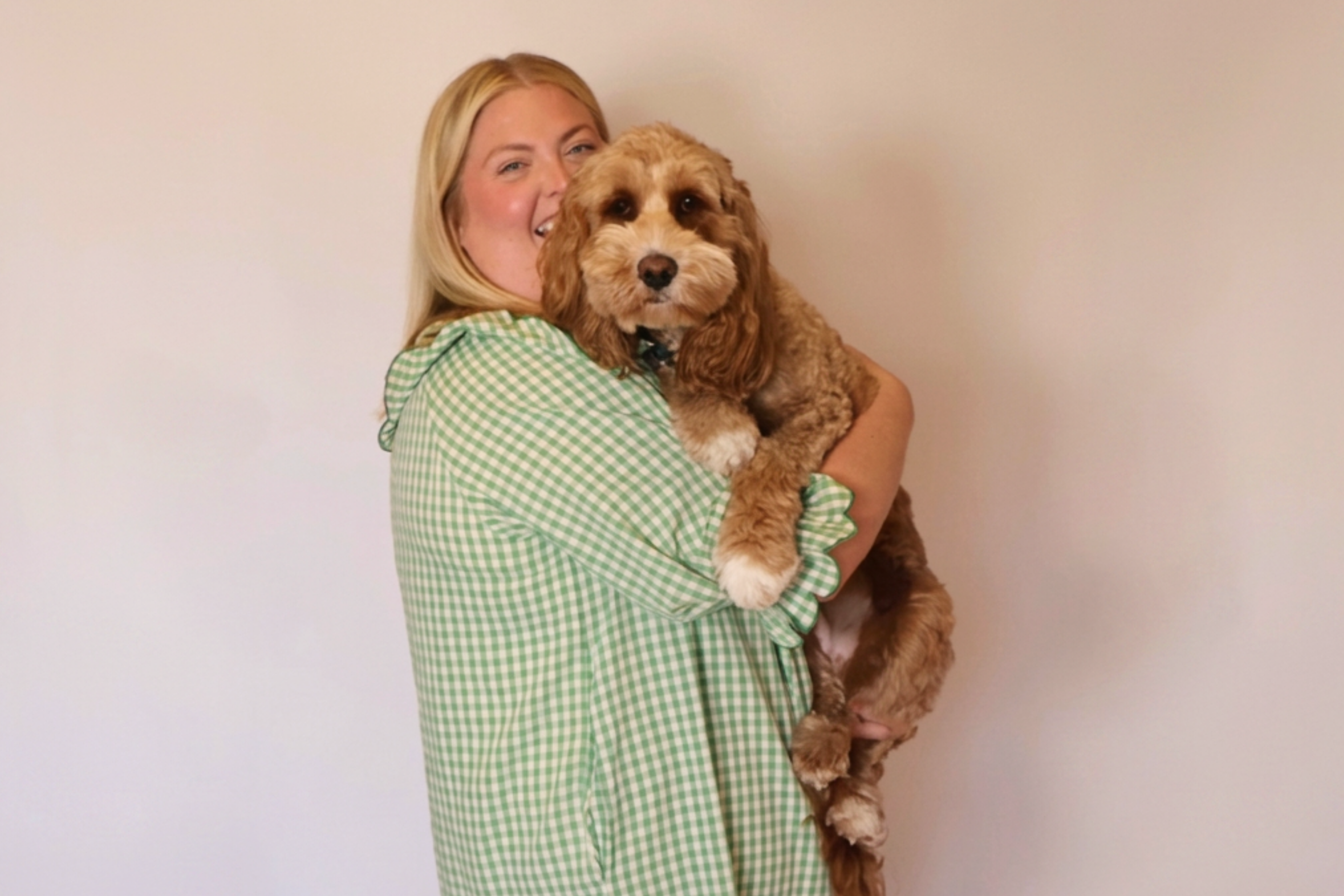 Photo of the founder, Dale Chapman, and her dog Clover.